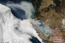 美国加州山火燃烧超400万英亩 致31人死亡