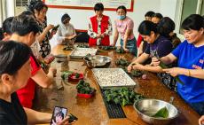 安徽庐江：粽叶飘香迎端午 爱心粽送残疾人
